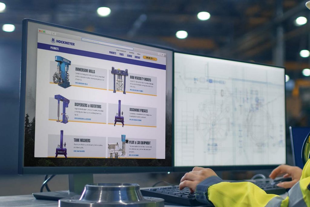 Image of a worker looking at a Product Listing custom web design for Hockmeyer Equipment Corporation